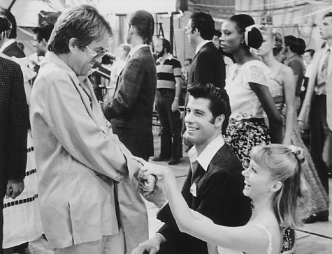 Still of John Travolta, Olivia Newton-John and Allan Carr in Grease (1978)