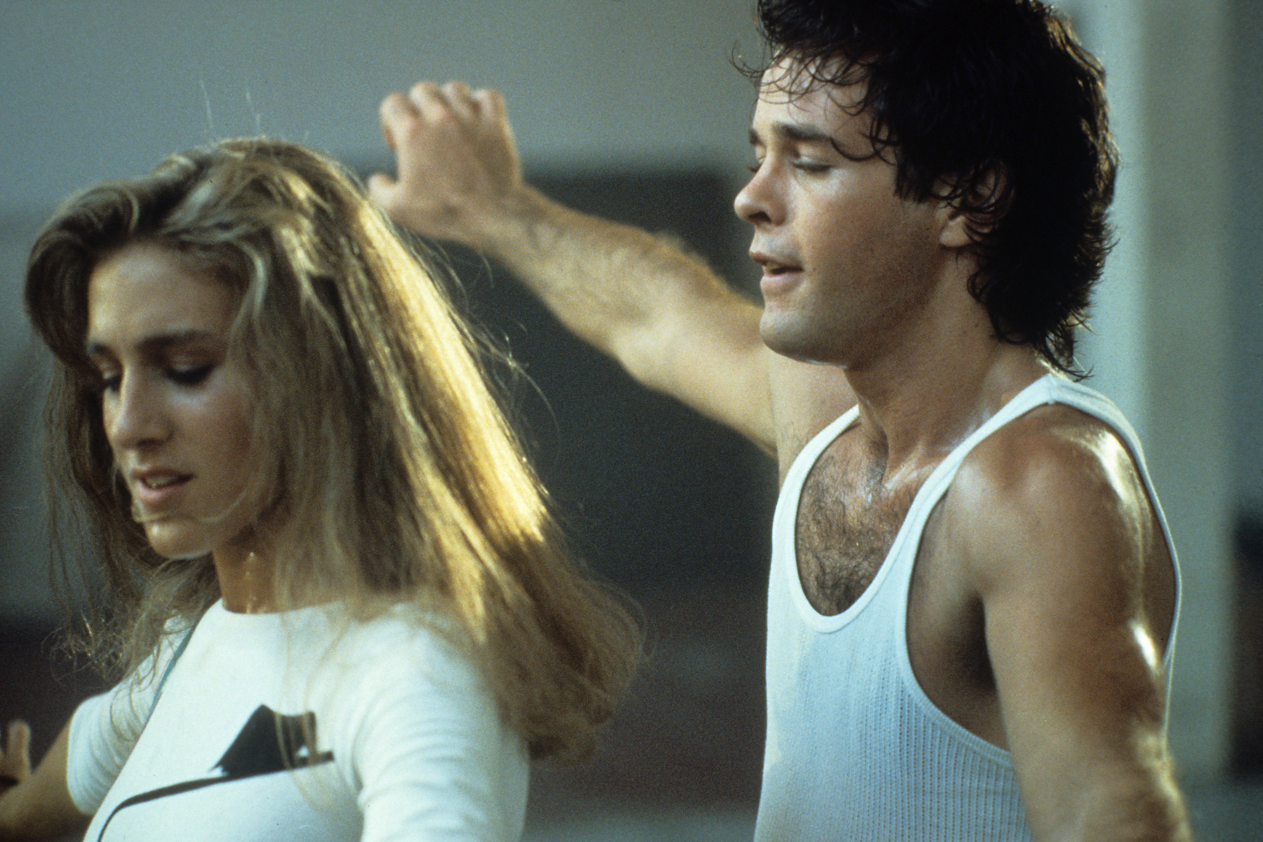 Still of Sarah Jessica Parker and Lee Montgomery in Girls Just Want to Have Fun (1985)