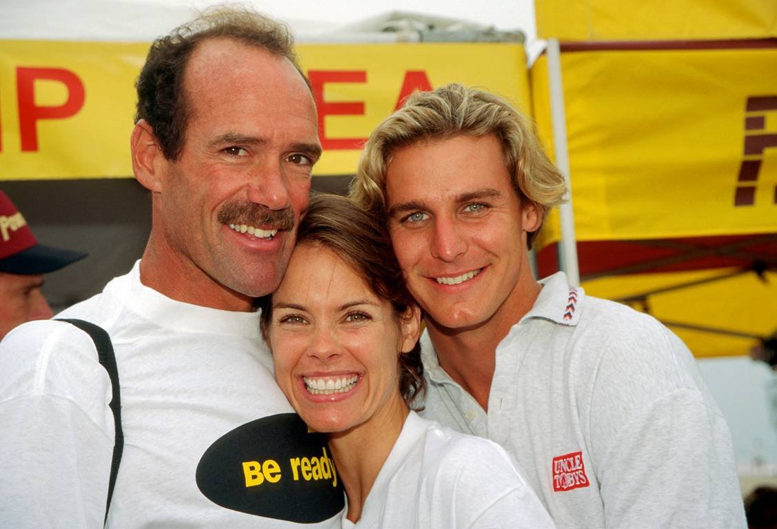 Alexandra Paul with Baywatch co-star Michael Newman and General Hospital's Ingo Rademacher at the Malibu Triathlon 1996