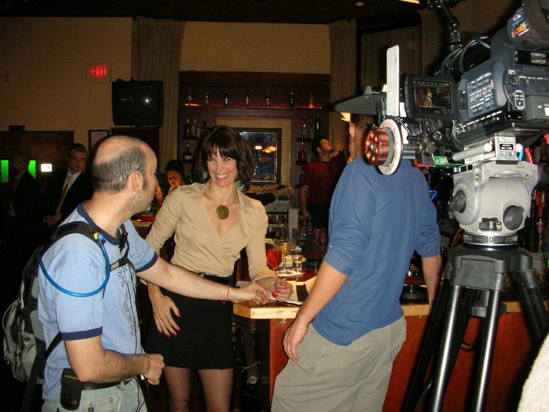 Alexandra Paul with actor Bryan Fisher and camera operator Adam Metzler on the set of He's Such a Girl 2007