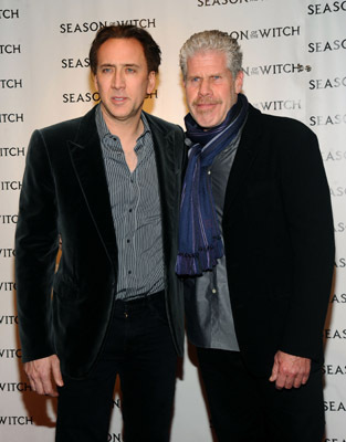 Nicolas Cage and Ron Perlman at event of Juodosios raganos metai (2011)