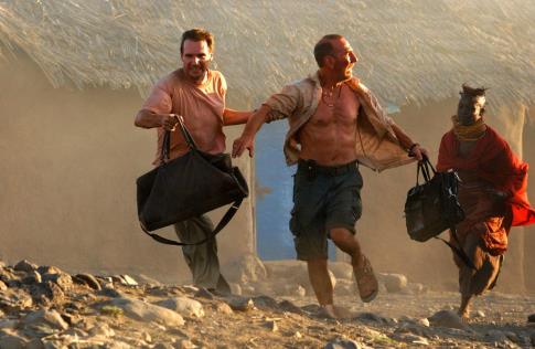 Ralph Fiennes (left) and Pete Postlethwaite (right) star in Fernando Meirelles' THE CONSTANT GARDENER, a Focus Features release.