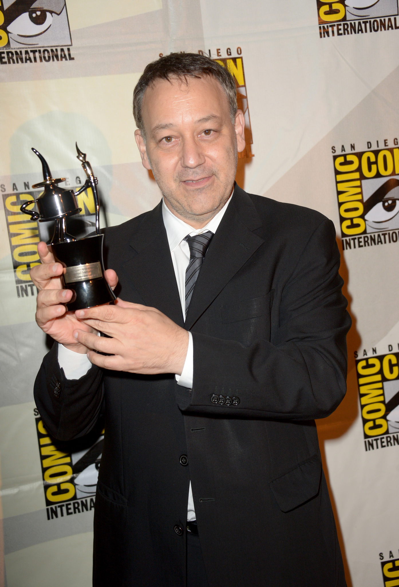 Director Sam Raimi, recipient of Comic-Con International's Inkpot Award, during a surprise appearance during Comic-Con International 2014 at San Diego Convention Center on July 25, 2014 in San Diego, California.