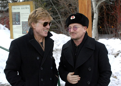 Robert Redford and Bono at event of U2 3D (2007)