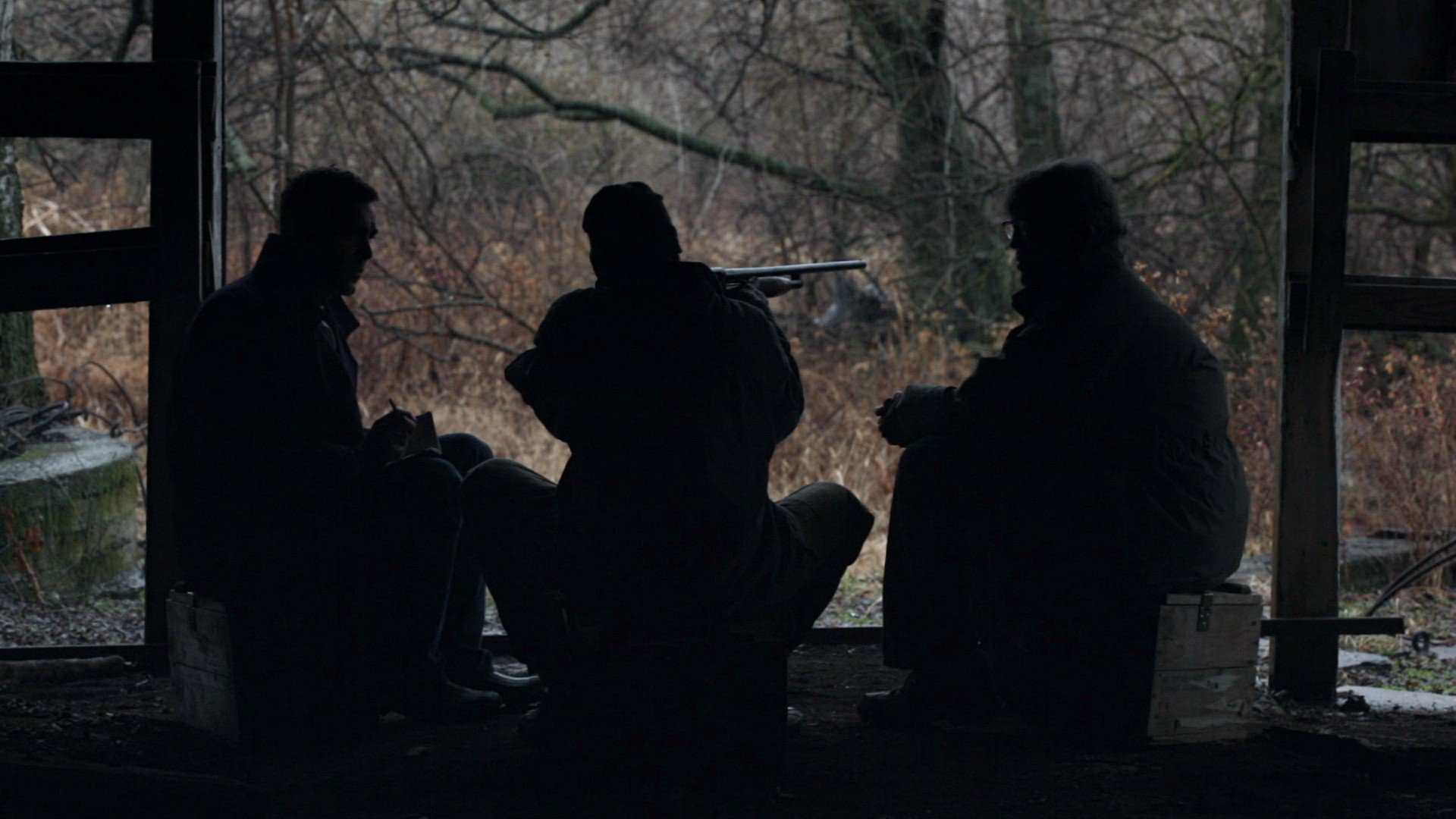 Matt Harper (Steve Talley)and Ronnie Bullock (Eric Roberts) with Possum (Clay Brocker) in a pivotal scene in Deadline.