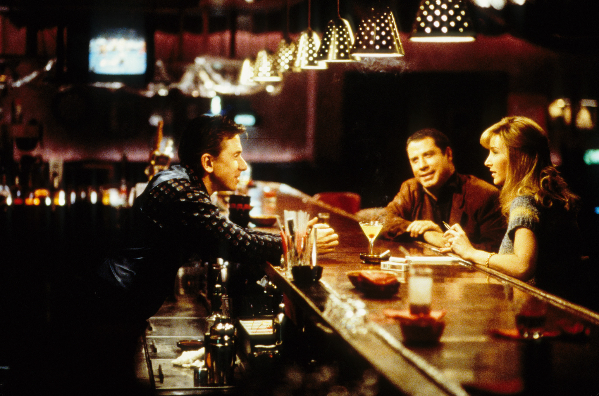 Still of John Travolta, Tim Roth and Lisa Kudrow in Lucky Numbers (2000)