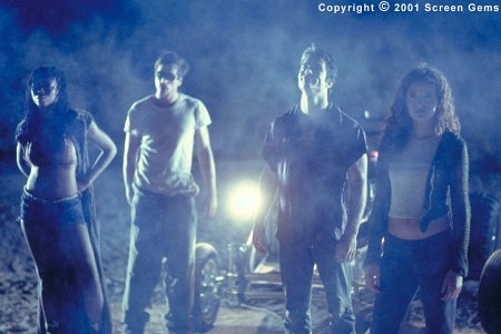 Cym (Phina Ourche,) Pen (Simon Rex,) Kit (Johnathon Schaech) and Teddy (Alexis Thorpe) are a roving band of forsaken youths who viciously feed on the hapless victims they find in the dead of night along deserted highways