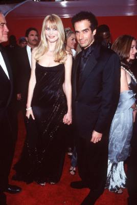 Claudia Schiffer and David Copperfield at event of The 70th Annual Academy Awards (1998)