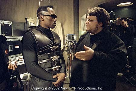 Wesley Snipes (left) and Director Guillermo del toro discussing a scene on the set of New Line Cinema's action thriller, BLADE II.