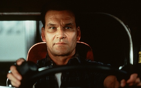 Patrick Swayze stars as Jack Crews, an ex-con who is duped into driving a sm i-truck loaded with illegal weapons.