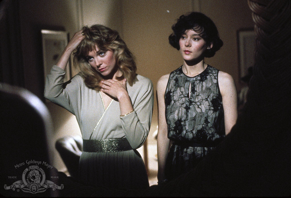 Still of Kim Cattrall and Meg Tilly in Masquerade (1988)