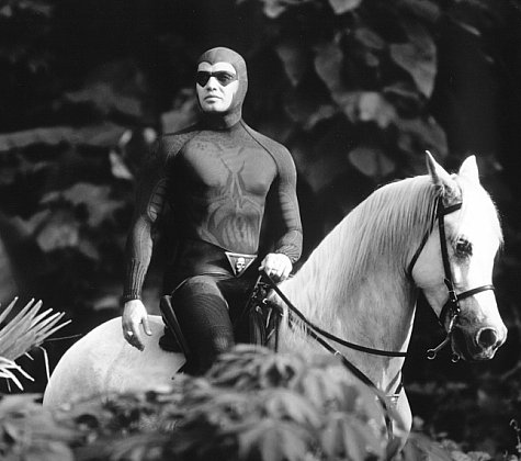 The Phantom (Billy Zane) roams thejungle on his dependable horse, Hero.