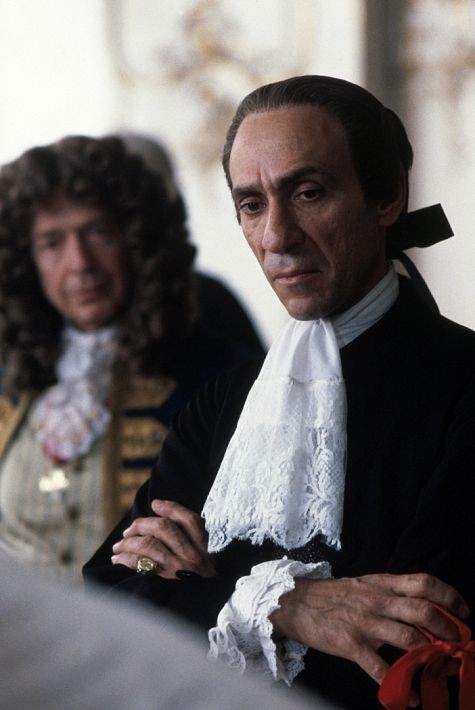 Salieri (F. MURRAY ABRAHAM) with Baron Van Swieten (JONATHAN MOORE, in background)