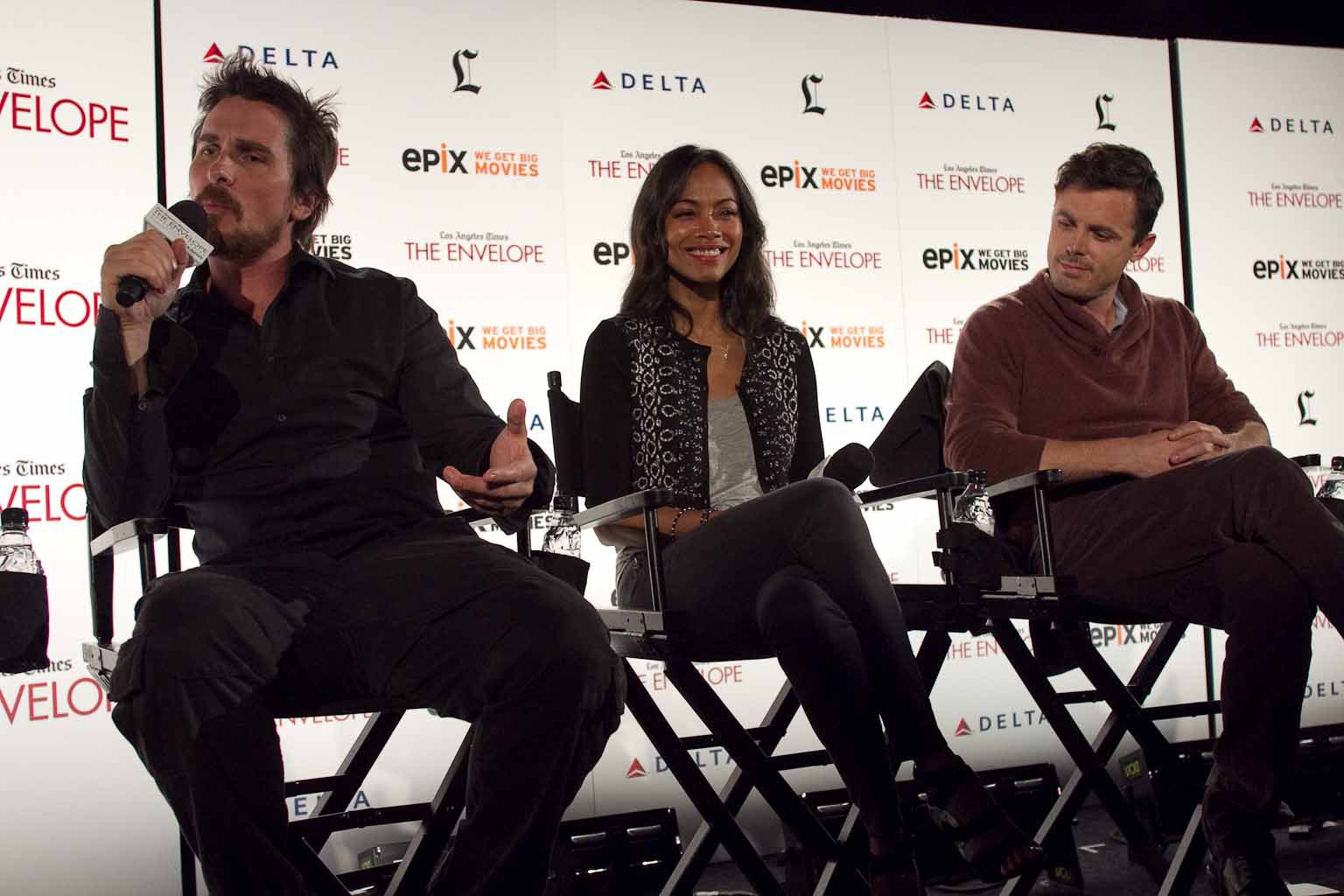 Christian Bale, Casey Affleck and Zoe Saldana at event of Out of the Furnace (2013)