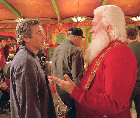 Director Michael Lembeck (left) chats off-camera with Xmas's Main Man, Santa Claus (Tim Allen, right).