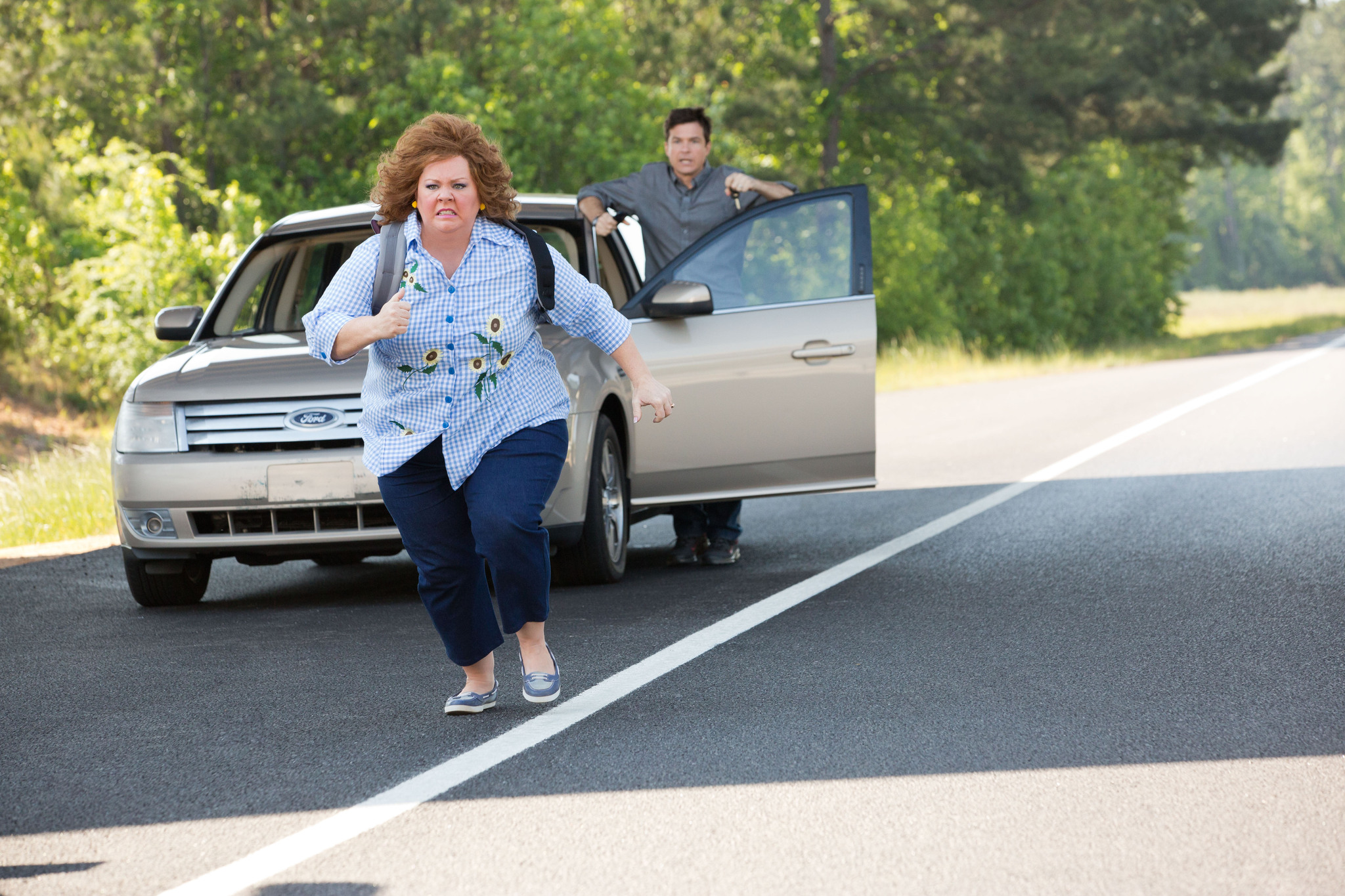 Still of Jason Bateman and Melissa McCarthy in Tapatybes vagile (2013)