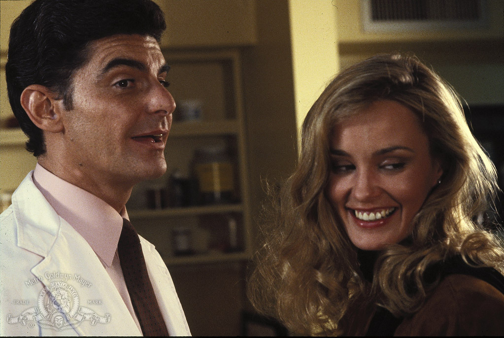 Still of Richard Benjamin and Jessica Lange in How to Beat the High Co$t of Living (1980)