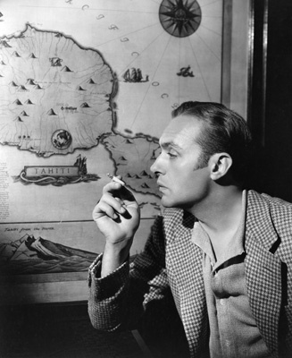 Charles Boyer in his home's library