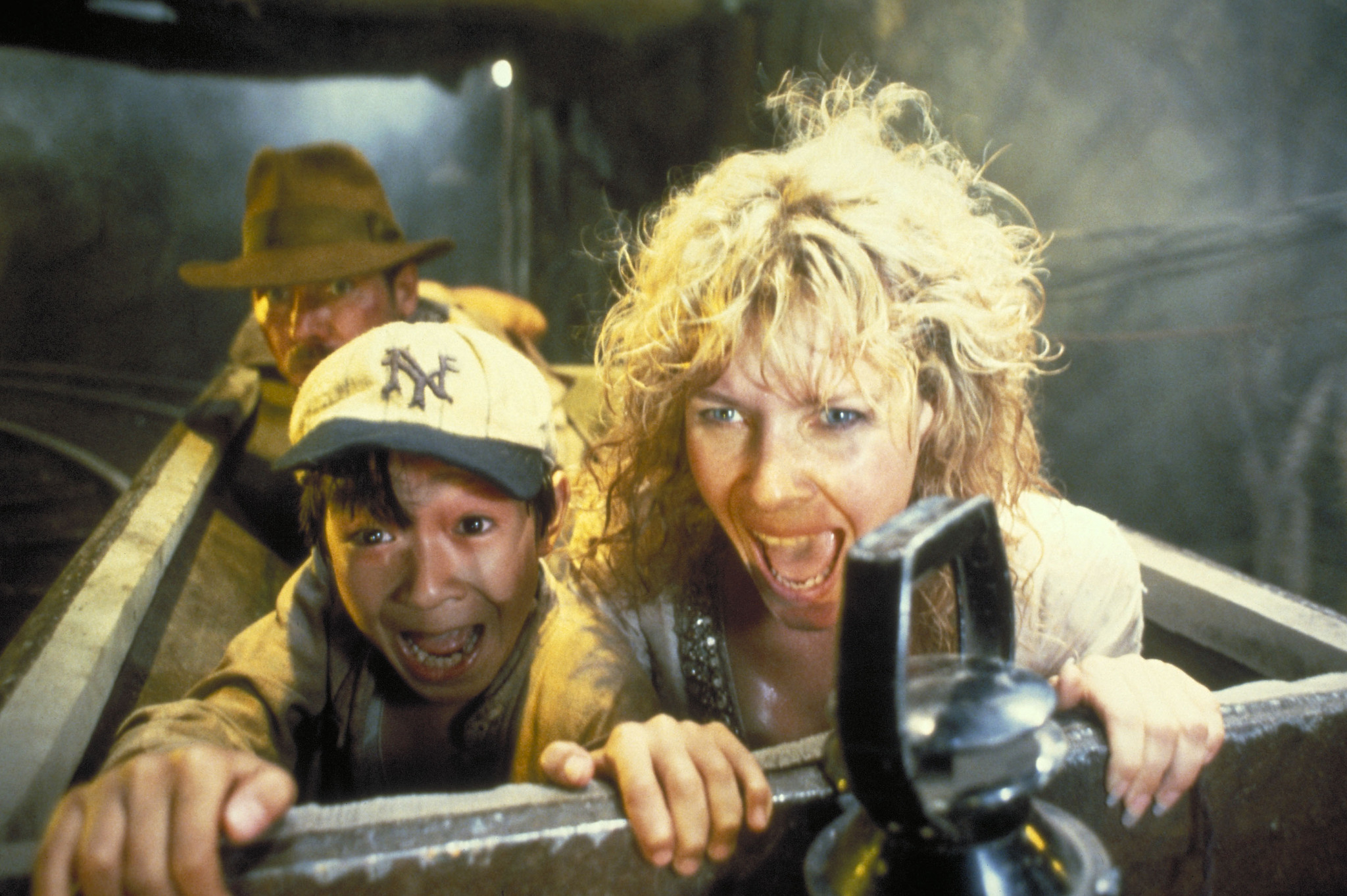 Still of Harrison Ford, Kate Capshaw and Jonathan Ke Quan in Indiana Dzounsas ir lemties sventykla (1984)