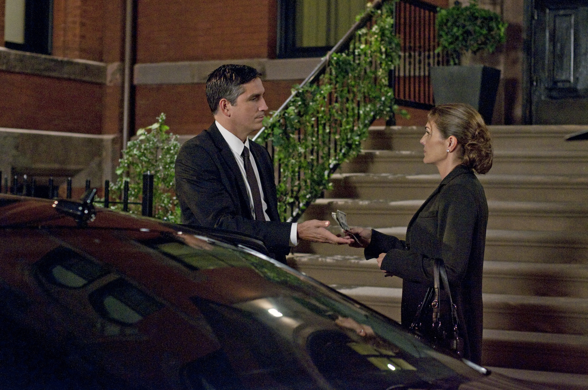 Still of Jim Caviezel and Paige Turco in Person of Interest (2011)