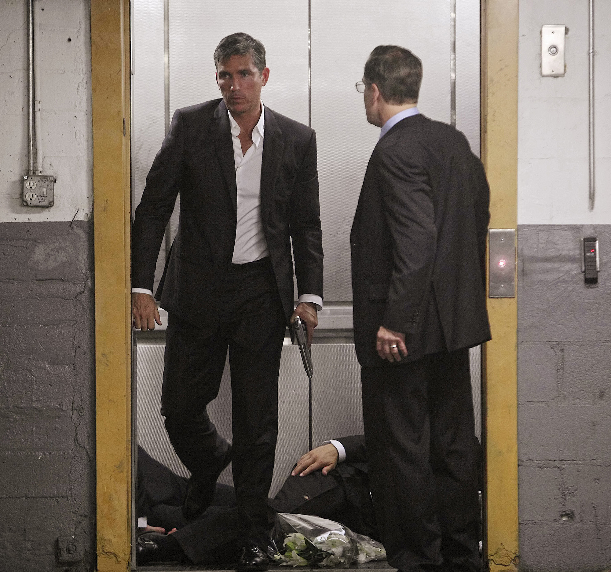 Still of Jim Caviezel and John Hillner in Person of Interest (2011)