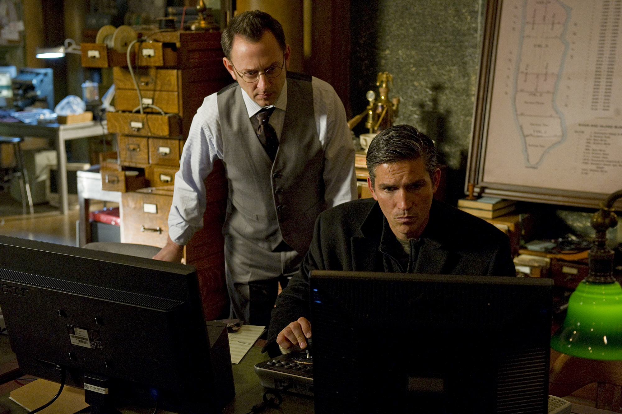 Still of Jim Caviezel and Michael Emerson in Person of Interest (2011)