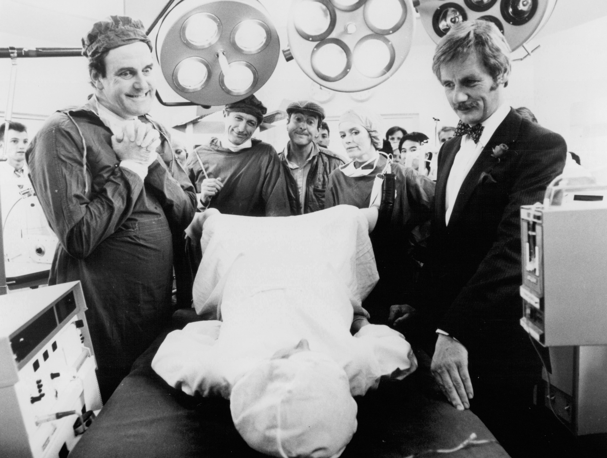 Still of John Cleese, Graham Chapman, Eric Idle and Michael Palin in The Meaning of Life (1983)