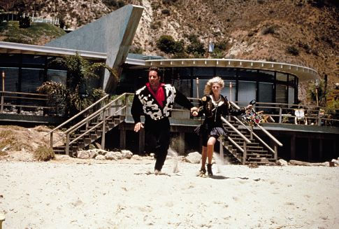 Still of Andrew Dice Clay and Maddie Corman in The Adventures of Ford Fairlane (1990)