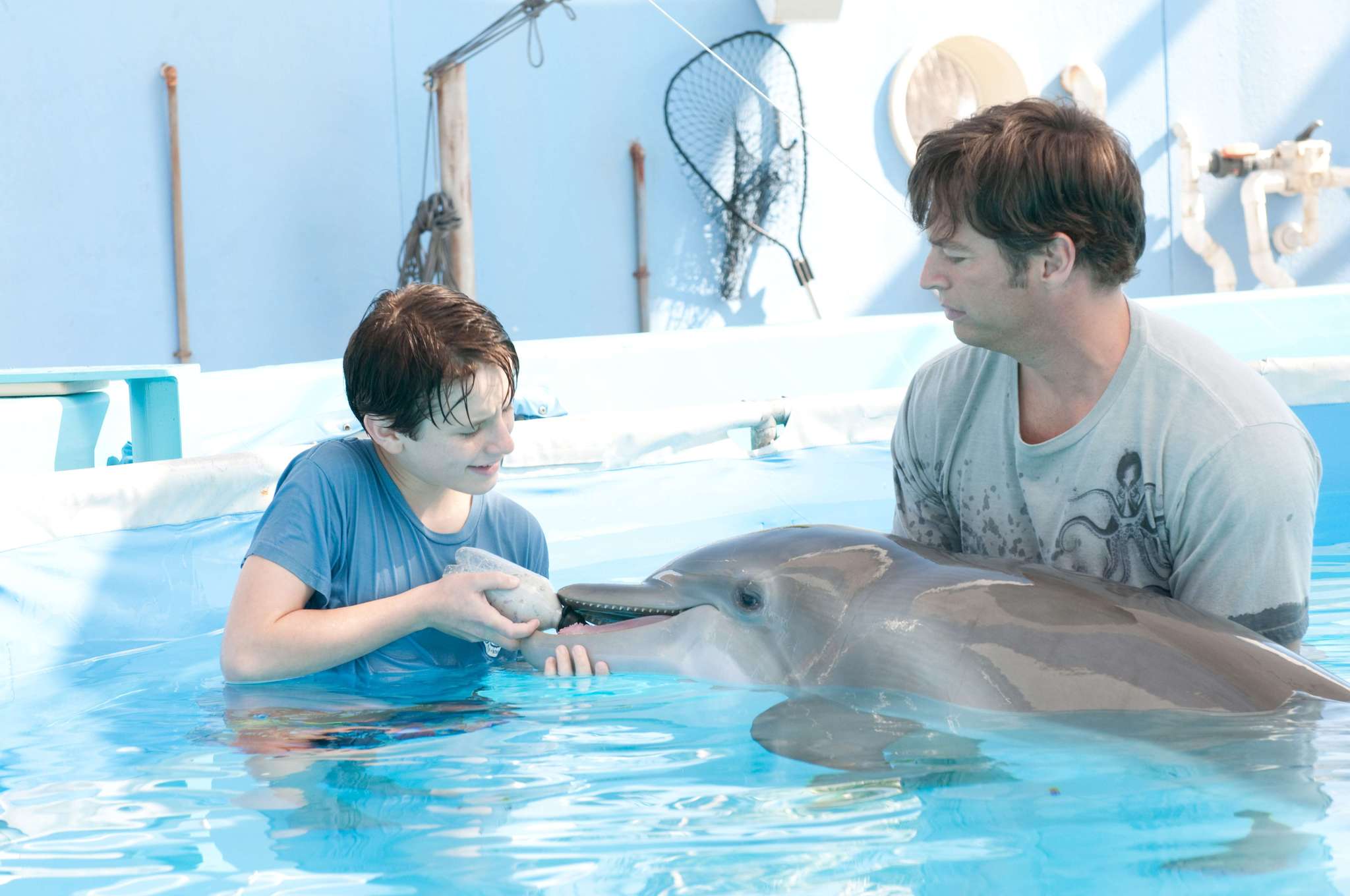 Still of Harry Connick Jr. and Nathan Gamble in Dolphin Tale (2011)