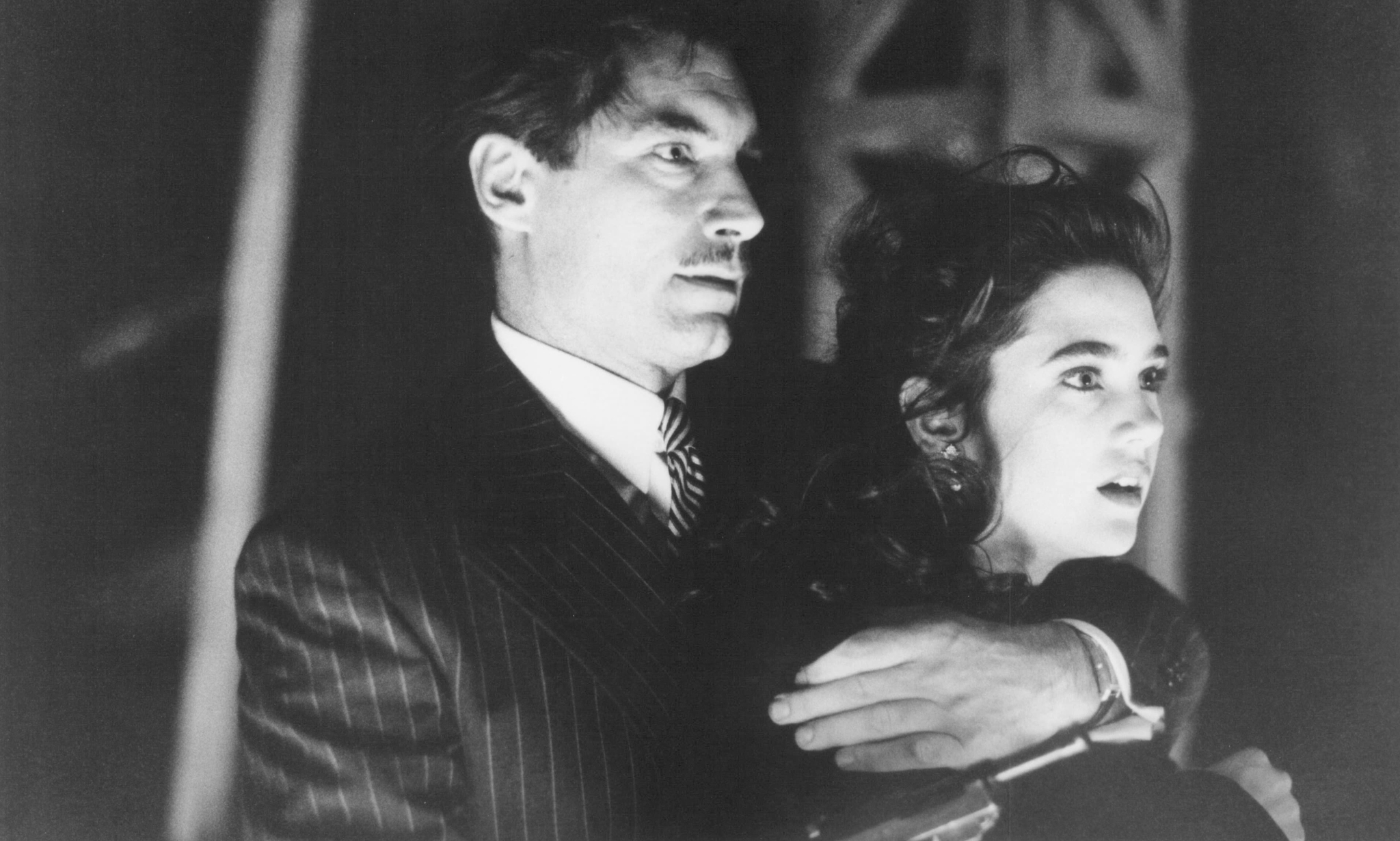 Still of Jennifer Connelly and Timothy Dalton in The Rocketeer (1991)