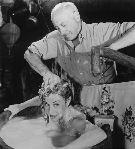 Still of Cecil B. DeMille and Paulette Goddard in Unconquered (1947)