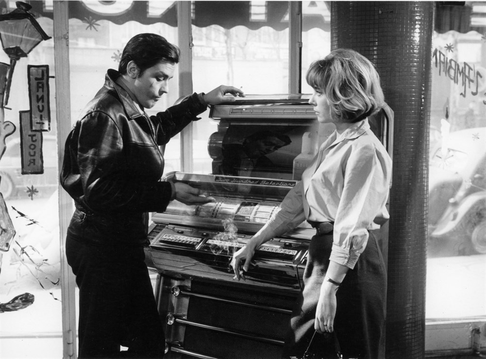 Still of Alain Delon and Carla Marlier in Mélodie en sous-sol (1963)