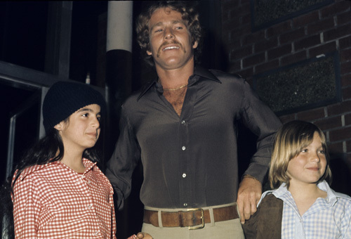 Ryan O'Neal with daughter Tatum and Bob Dylan's daughter circa 1970s