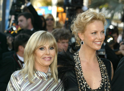 Charlize Theron and Britt Ekland at event of The Life and Death of Peter Sellers (2004)