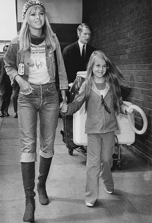 Britt Ekland with her daughter Victoria at a London airport