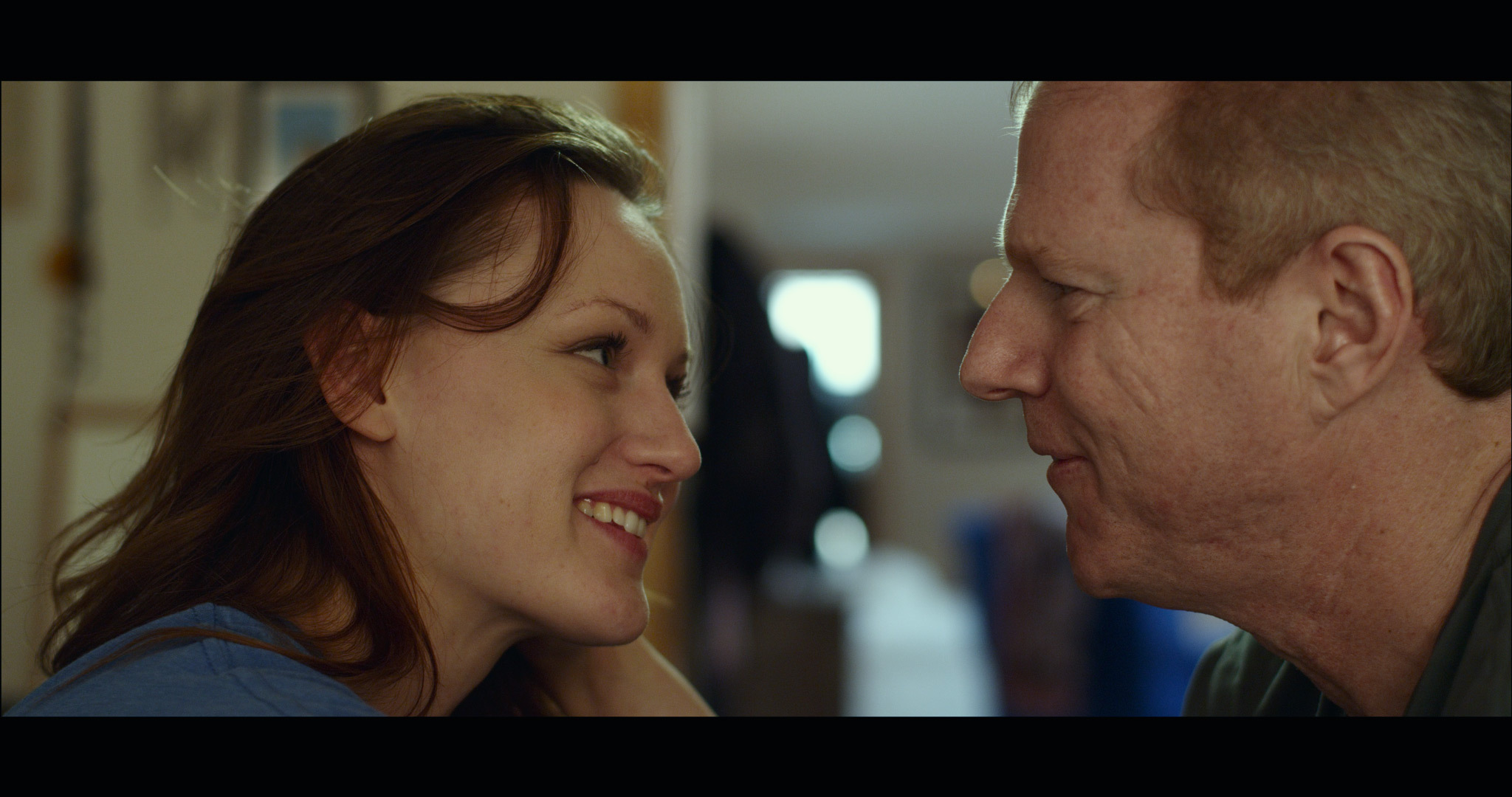 Still of Noah Emmerich and Kerry Bishé in The Fitzgerald Family Christmas (2012)