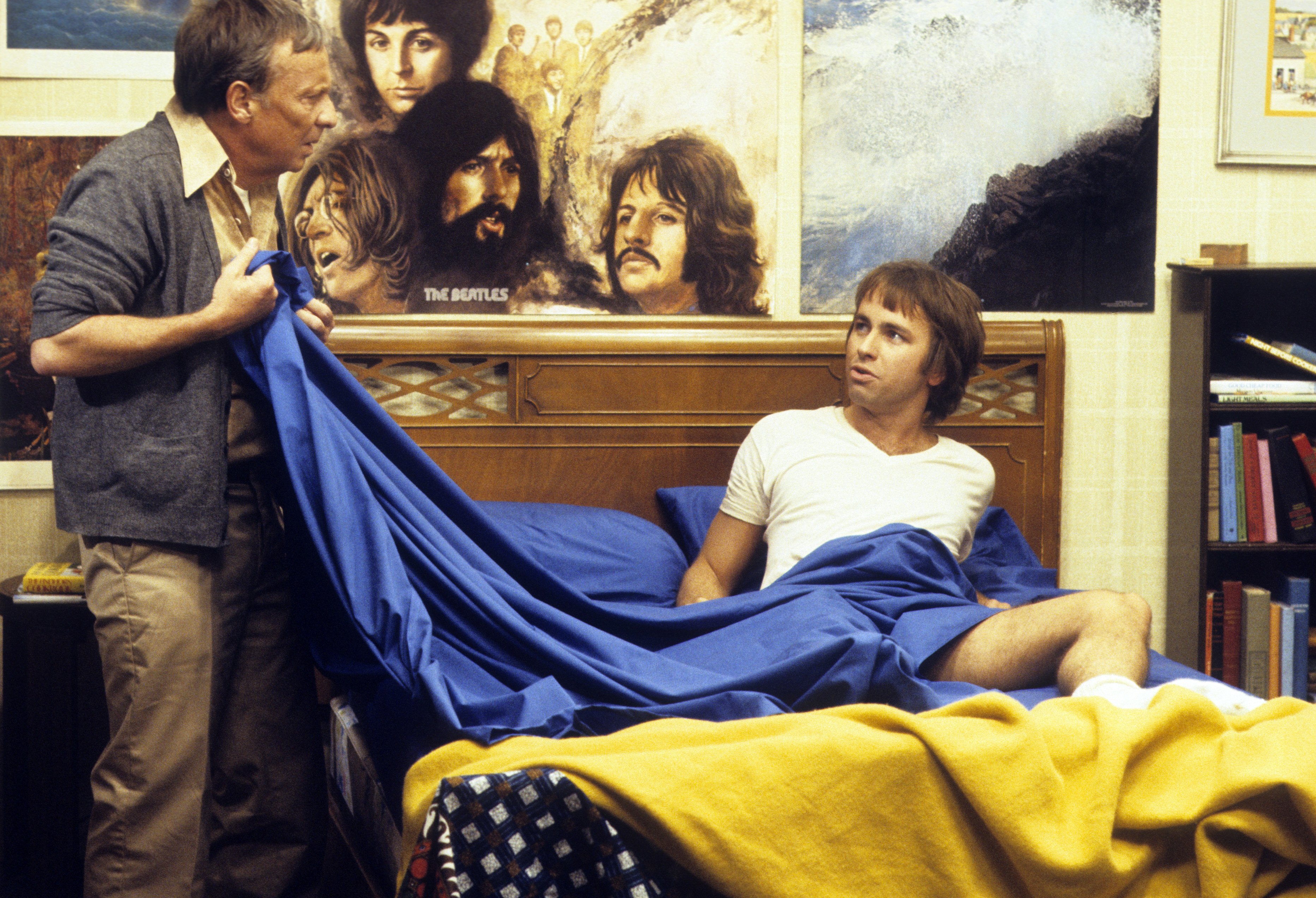 Still of John Ritter and Norman Fell in Three's Company (1977)