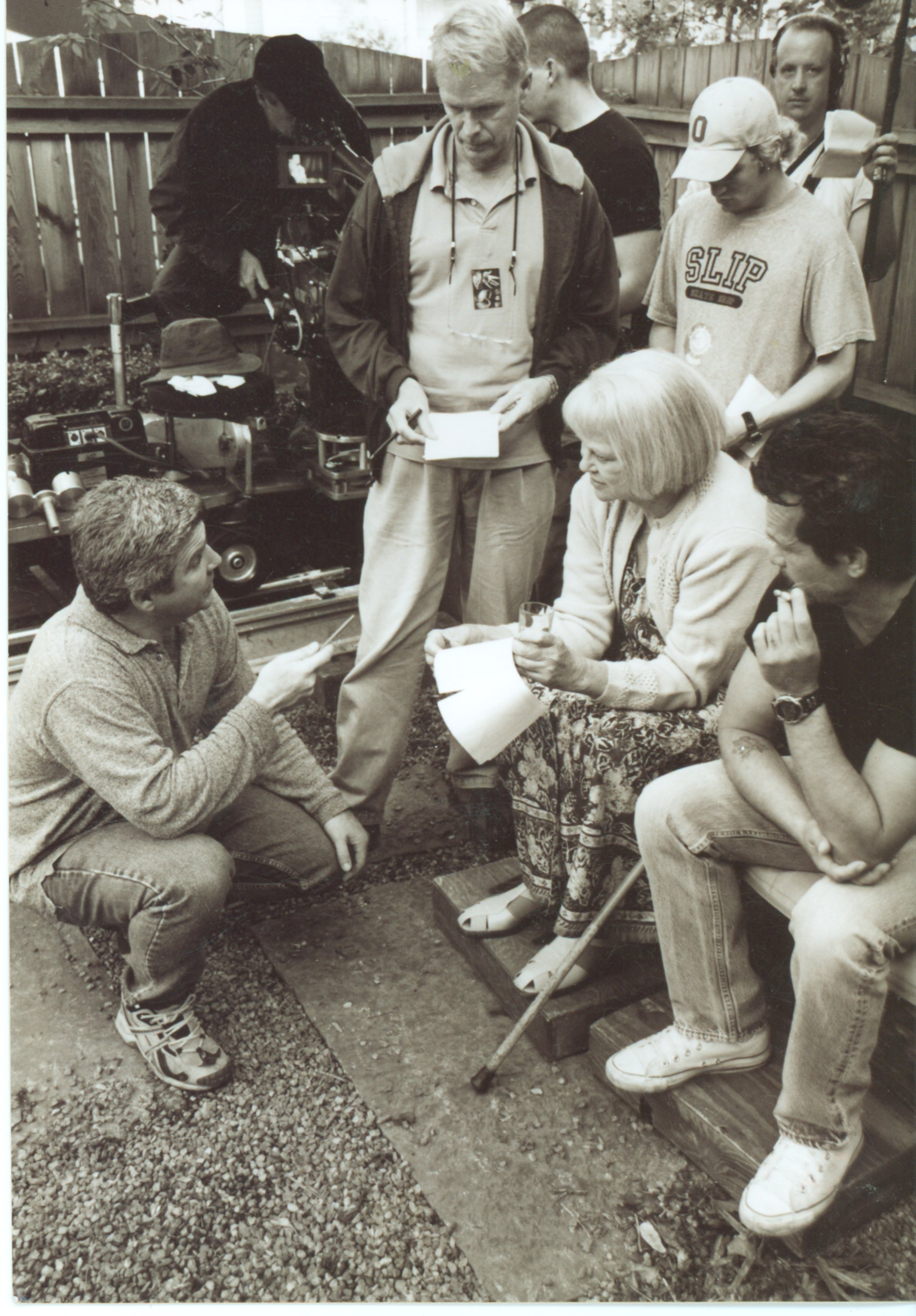 Director Robert Manganelli discusses a scene with cast and crew