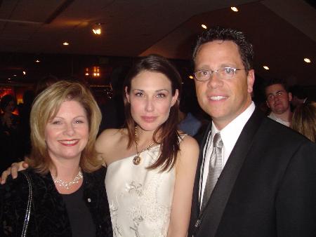 Jim Schmidt [R], wife Karen Schmidt [L] with Claire Forlani [C] at the Los Angeles premiere of 
