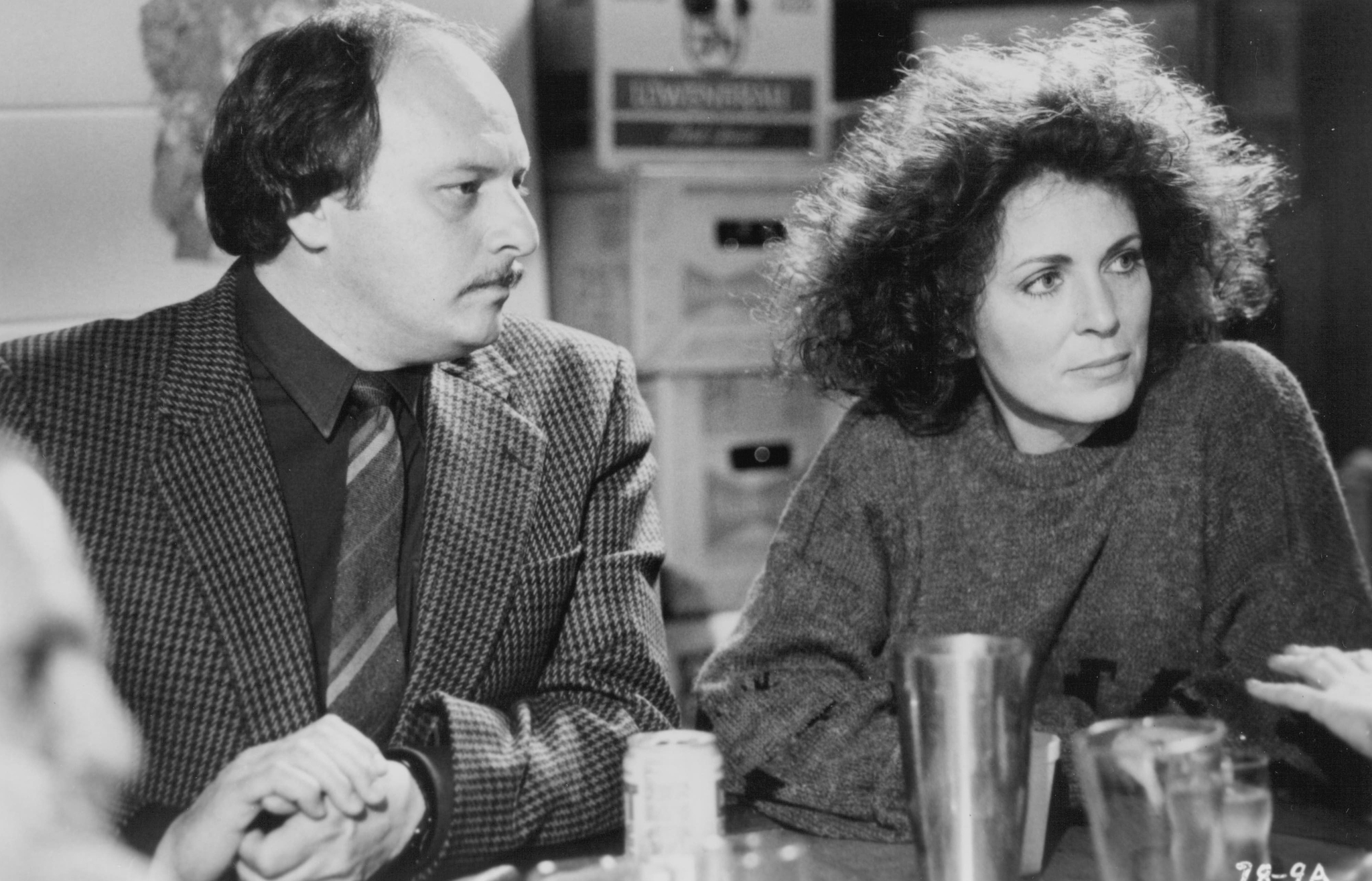 Still of Joanna Cassidy and Dennis Franz in The Package (1989)