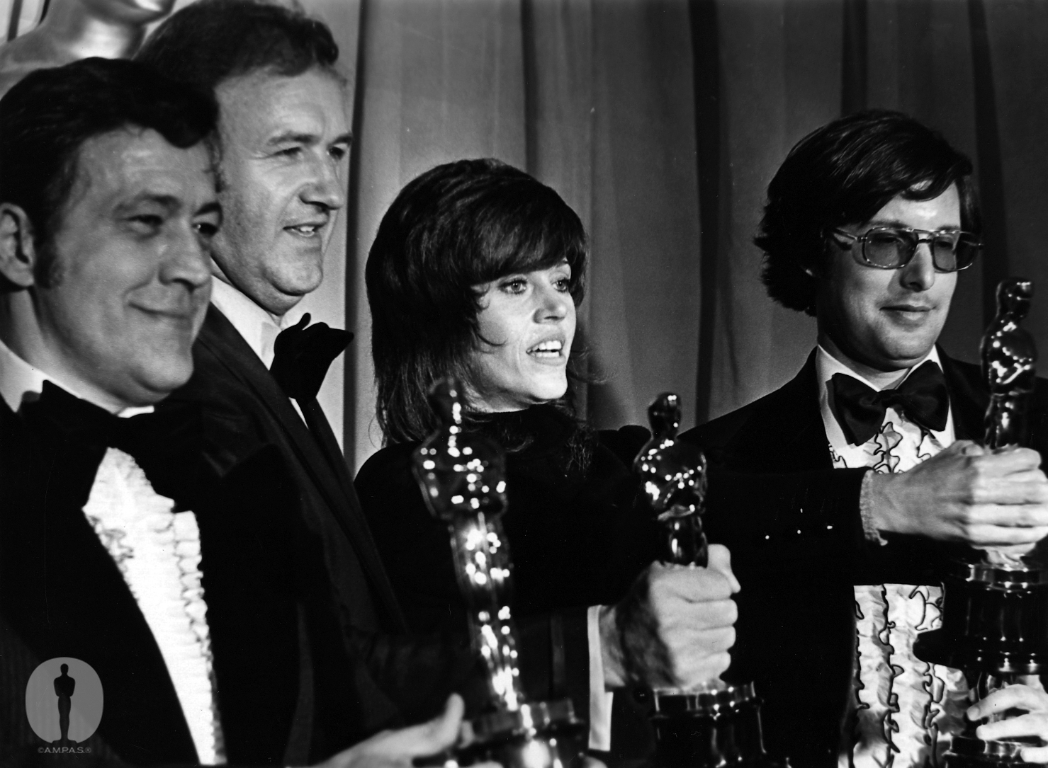 Best Actress Jane Fonda (Klute) flanked by The French Connection winners Philip DAntoni (Best Picture), Gene Hackman (Best Actor), and William Friedkin (Best Director) at the 44th Academy Awards.