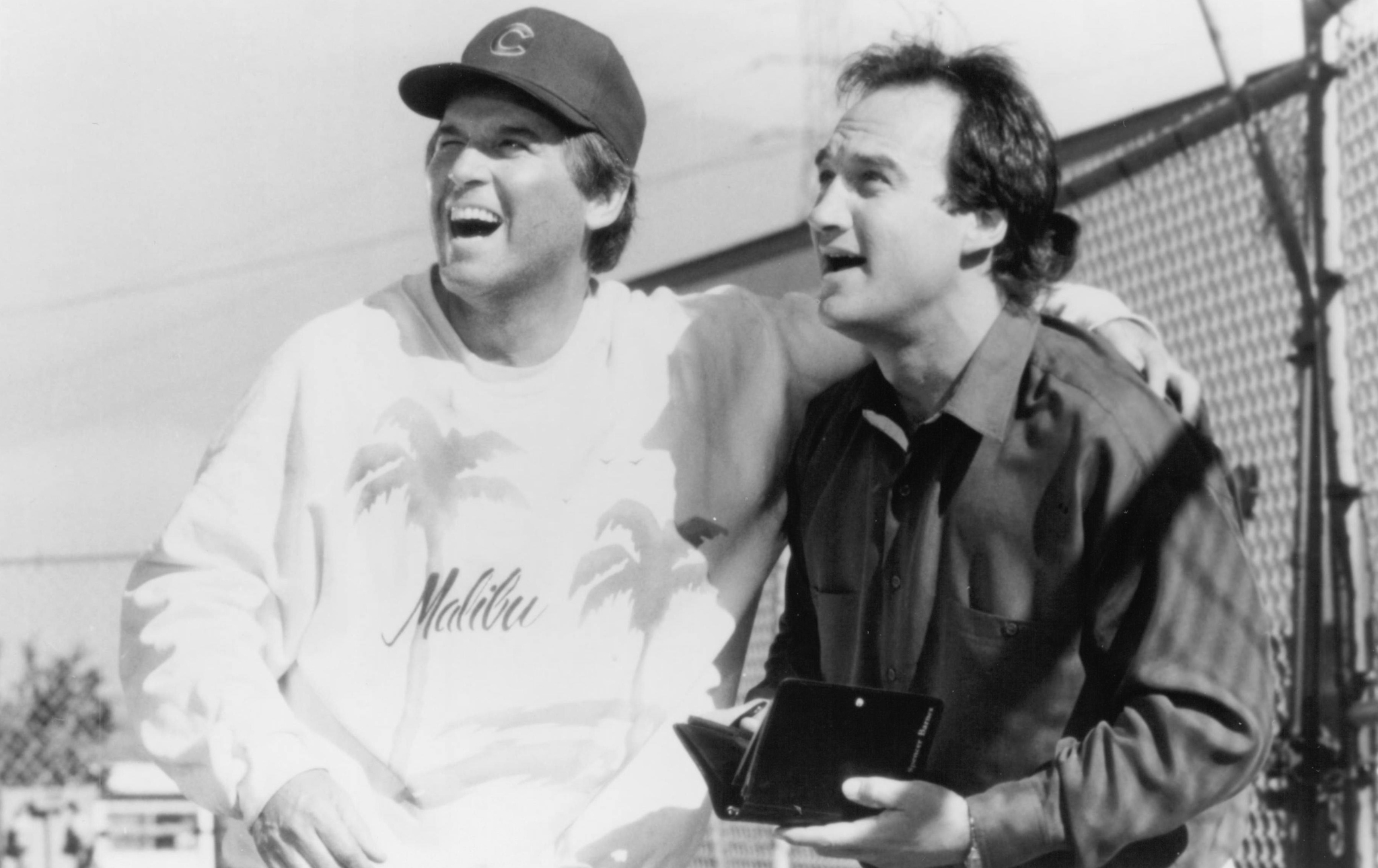 Still of James Belushi and Charles Grodin in Taking Care of Business (1990)