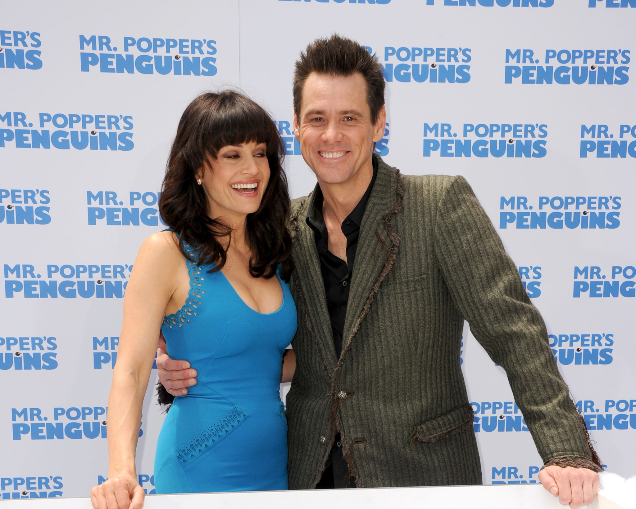 Jim Carrey and Carla Gugino