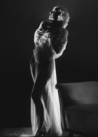 Jean Harlow standing semi-nude in a sheer gown, 1933. Modern silver gelatin, 14x11 unsgned, $600 Photo by George Hurrell / MPTV