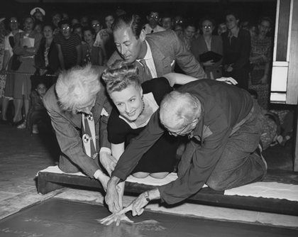 Irene Dunne, Rex Harrison and Sid Grauman at the Chinese Theatre Handprint Ceremony