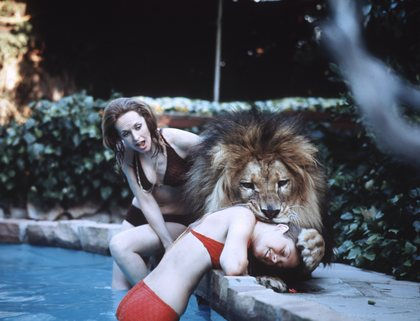 Tippi Hedren at home with her daughter Melanie Griffith and her pet lion