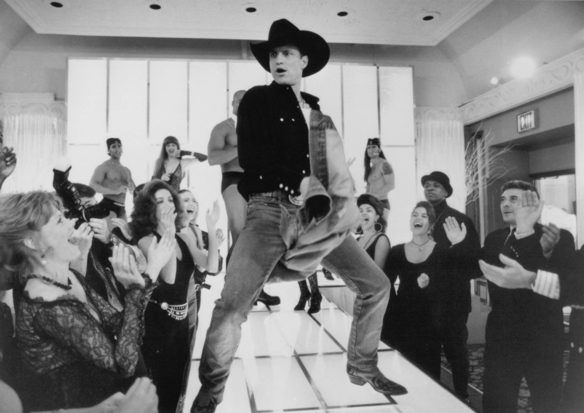 Still of Woody Harrelson and Marg Helgenberger in The Cowboy Way (1994)