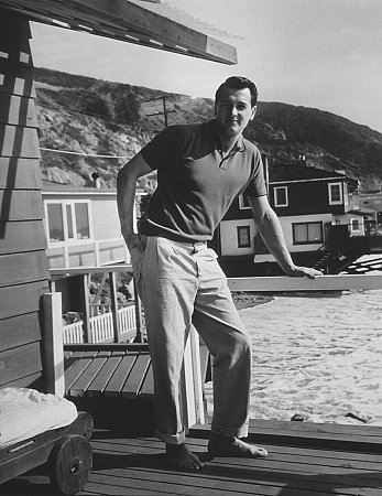 Rock Hudson at his Malibu beach home c.1960