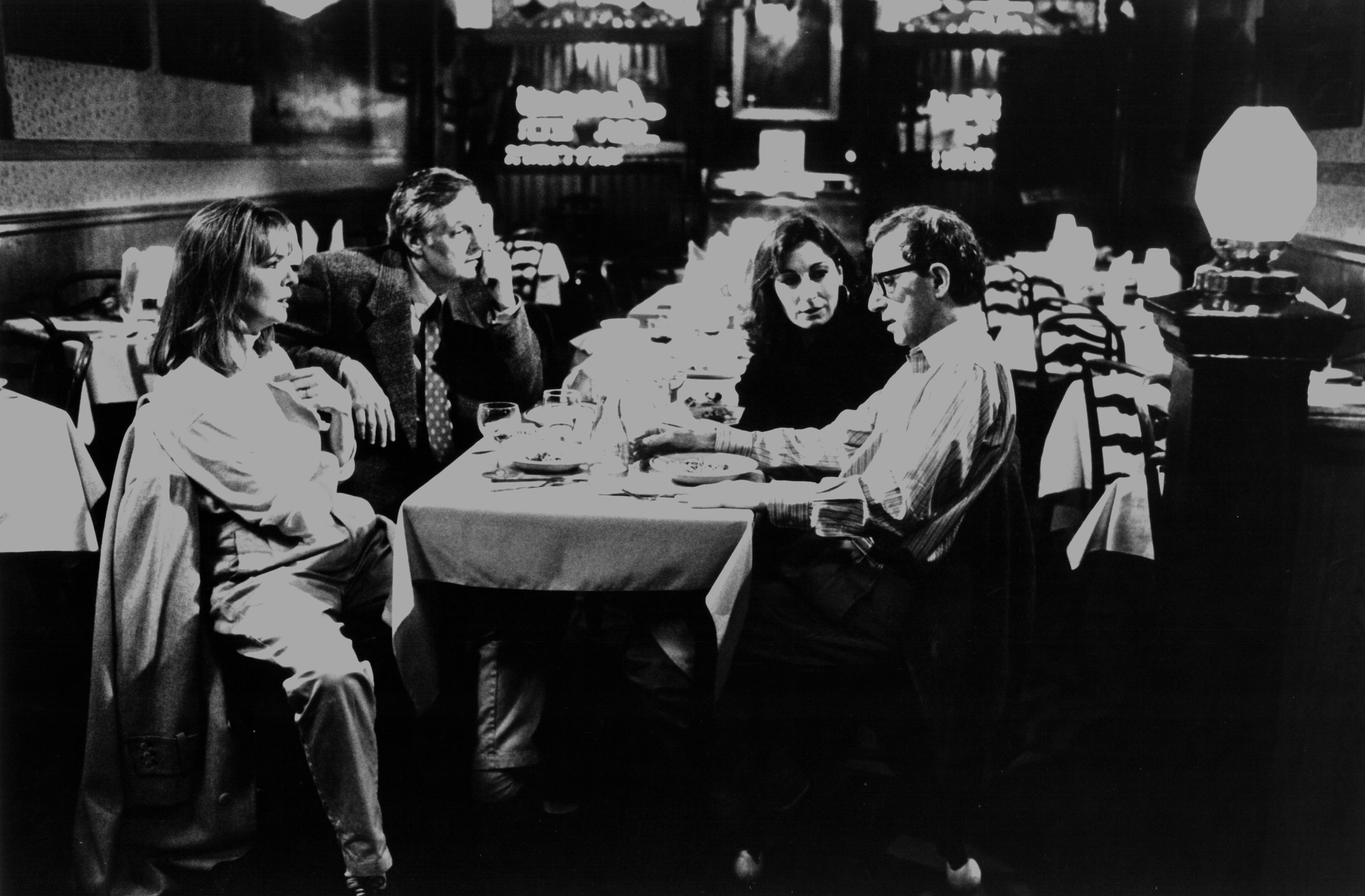 Still of Woody Allen, Alan Alda, Diane Keaton and Anjelica Huston in Manhattan Murder Mystery (1993)