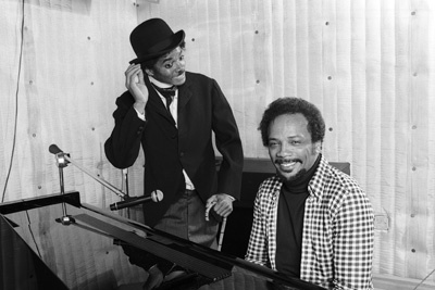 Michael Jackson and Quincy Jones composing songs in a Los Angeles recording studio